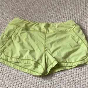 lime green athleta running shorts
